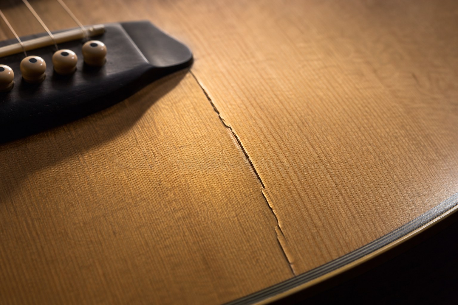 Humidity crack in a guitar top